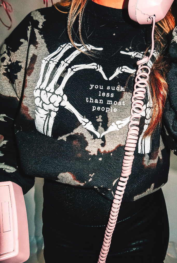You Suck Less Bomba Sweatshirt